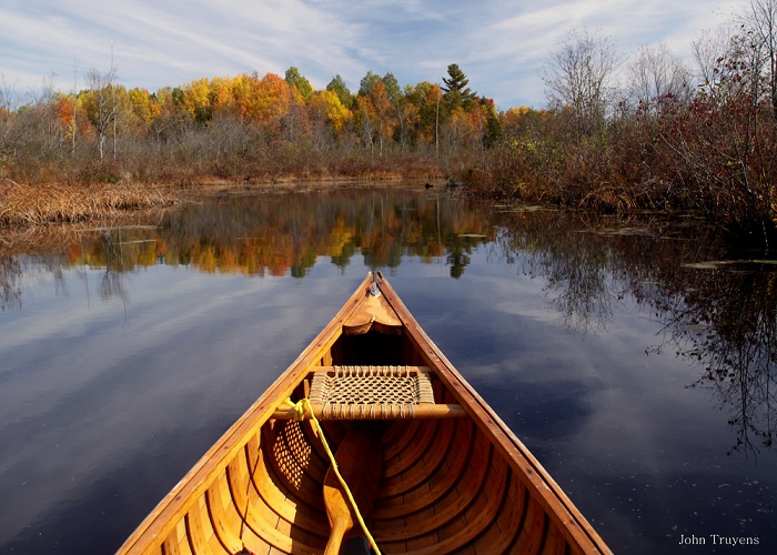 cedar canoe on water